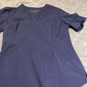 Women’s used scrub top med